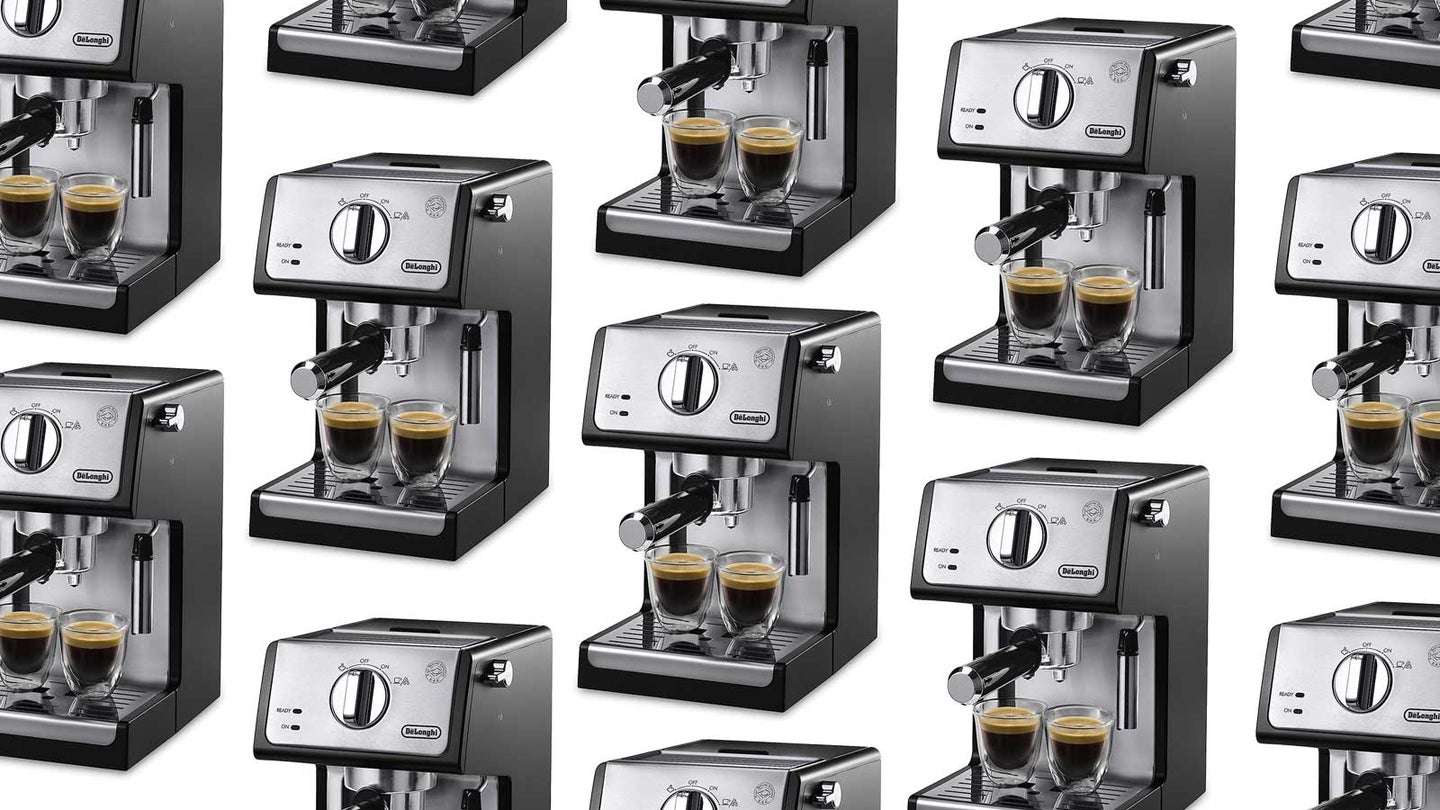 De'Longhi espresso machines arranged in a pattern on a plain background